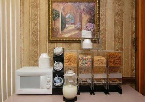 Executive Inn And Suites Ентърпрайз Екстериор снимка